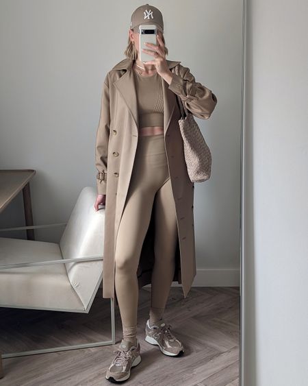 Casual neutrals outfit 🤎

Tan gym leggings
Tan gym bra
Toteme classic trench coat
New balance trainers
New era cap

#ltkfindsunder50 #ltku

