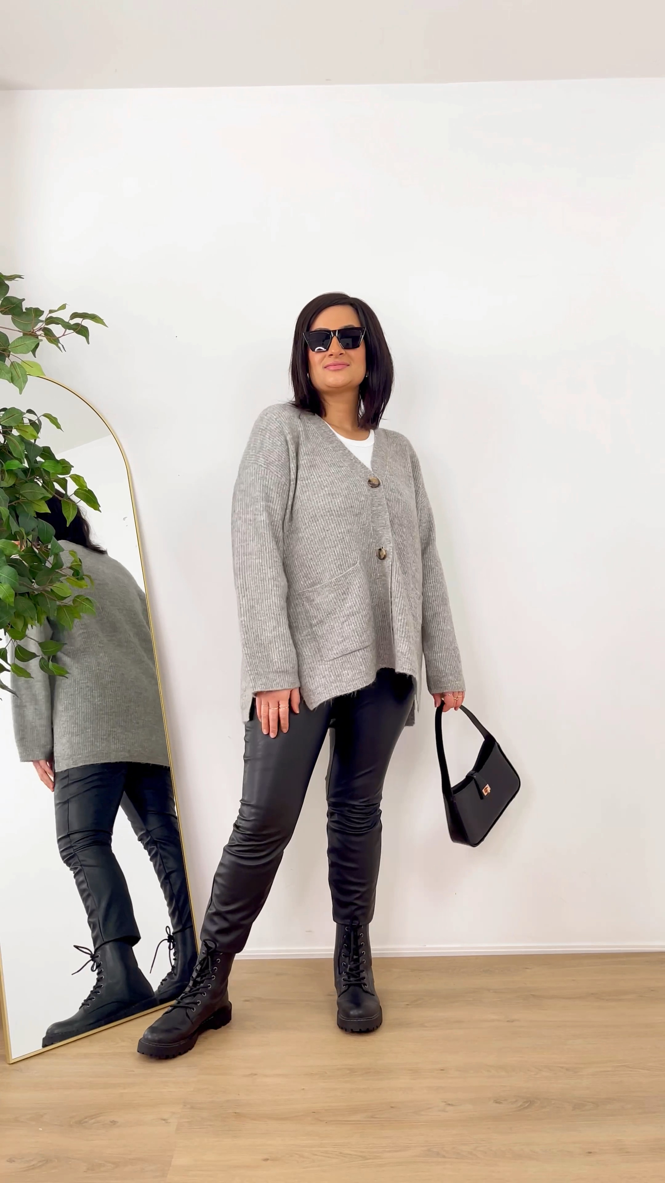 Casual street chic fall outfit with oversized cardigan, faux leather leggings and combat boots  from H&M 

#LTKfindsunder50 #LTKVideo #LTKstyletip