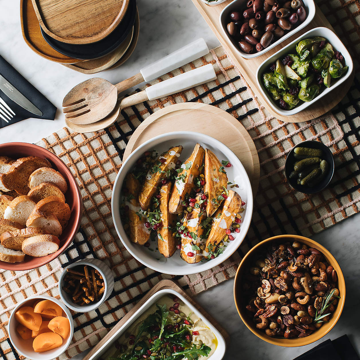 Oven-to-Table Oval Serving Bowls with Oval Wood Trivet + Reviews | Crate & Barrel | Crate & Barrel