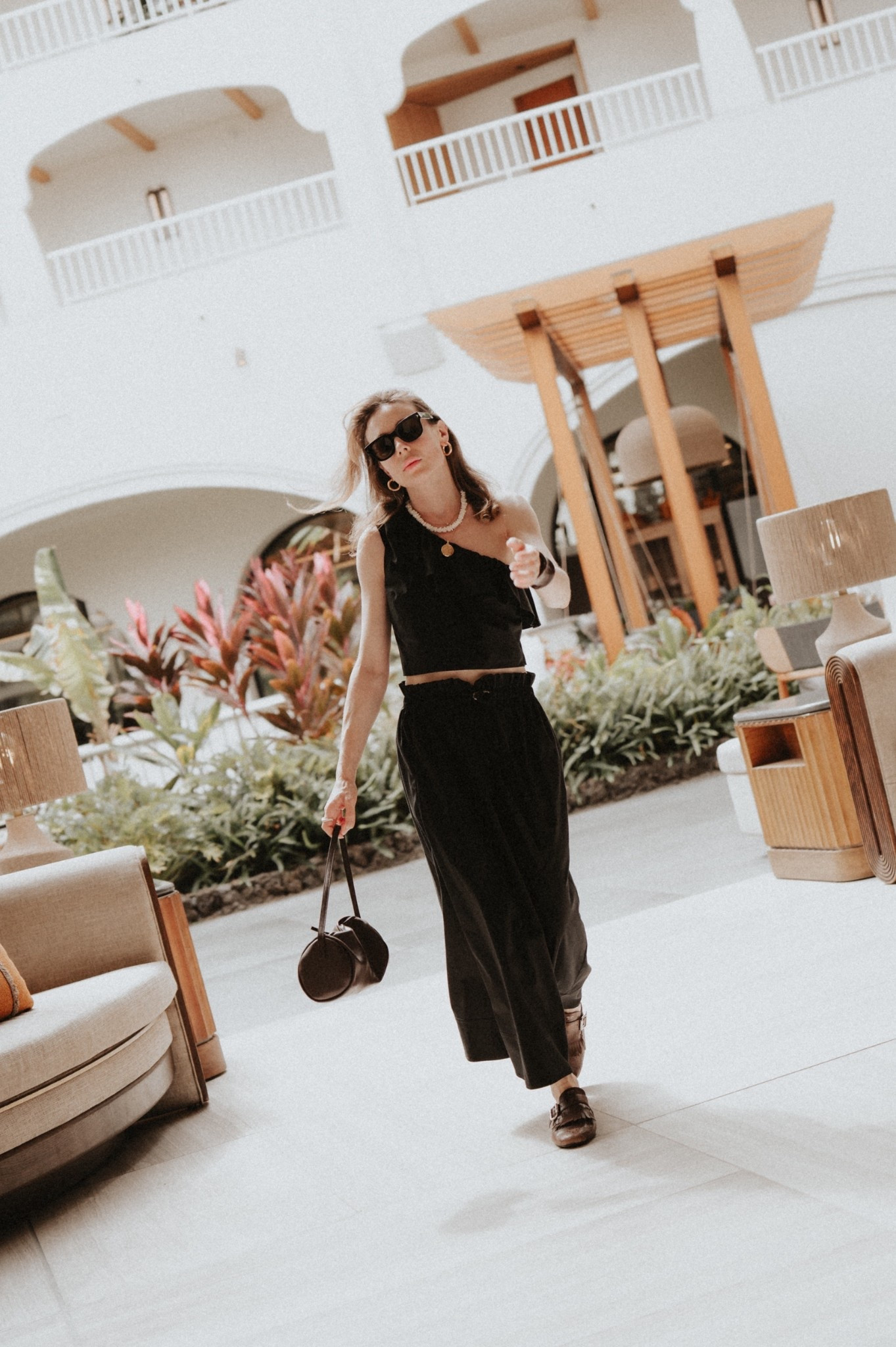 Party & holiday dressing: What I brought to Hawaii for nights out, part 1. Spoiler alert: nothing new, really, just mixed up some pieces & planning to do the same for the Holidays 🎄 If you know me: I’m always trying to get re-wearable pieces. 
Enter: asymmetrical & statement tops (if you want to buy something new 🆕 & go all in here’s a pro & money saving tip: wear with a skirt or pants you already have). 
Here wearing Sézane top (last year’s collection), Prada mules, St. Agni bag. Jewelry: David Yurman.
Linking my favorite strapless, asymmetrical & one shoulder tops & a few gorgeous dresses in this style (just in case). 
Resort: Fairmont Kea Lani Maui 

#LTKSeasonal #LTKHoliday #LTKTravel