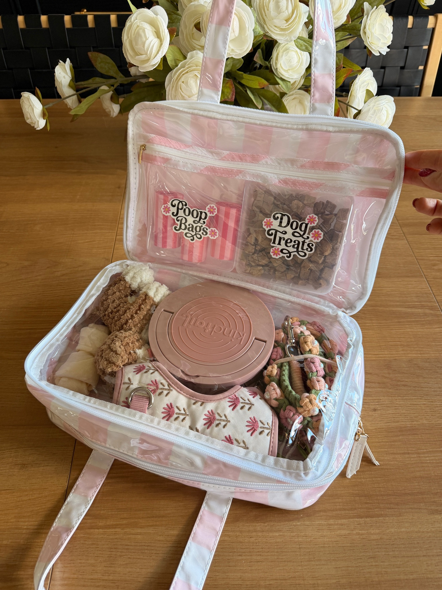 Keep everything you need for walks and outings organized in one cute grab-and-go bag! With spots for dog treats, poop bags, a collapsible bowl and other everyday pet essentials, this dog walking bag makes getting out the door with your pup so much easier.

#LTKSeasonal #LTKHome