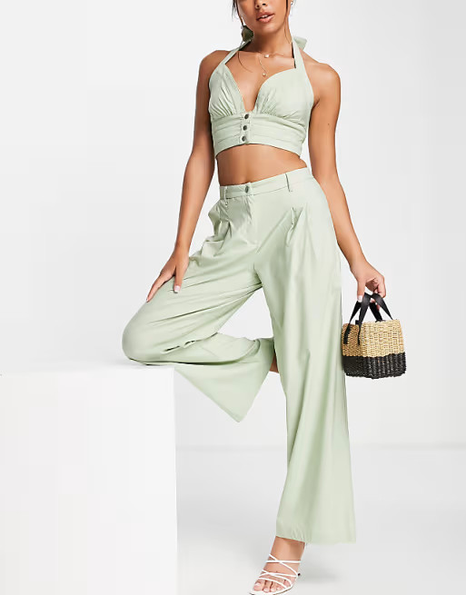 Skylar Rose 2 piece wide leg pants with halter neck crop top set in sage green | ASOS (Global)