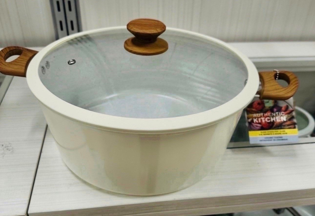 Elevated kitchen essentials on a budget. 👩‍🍳 This cream ceramic stock pot with the wood-effect handles is the perfect blend of functional and aesthetic. It looks so high-end sitting on the stove! Neutral lovers, this one is for you. #KitchenFinds #HomeDecor #NeutralAesthetic