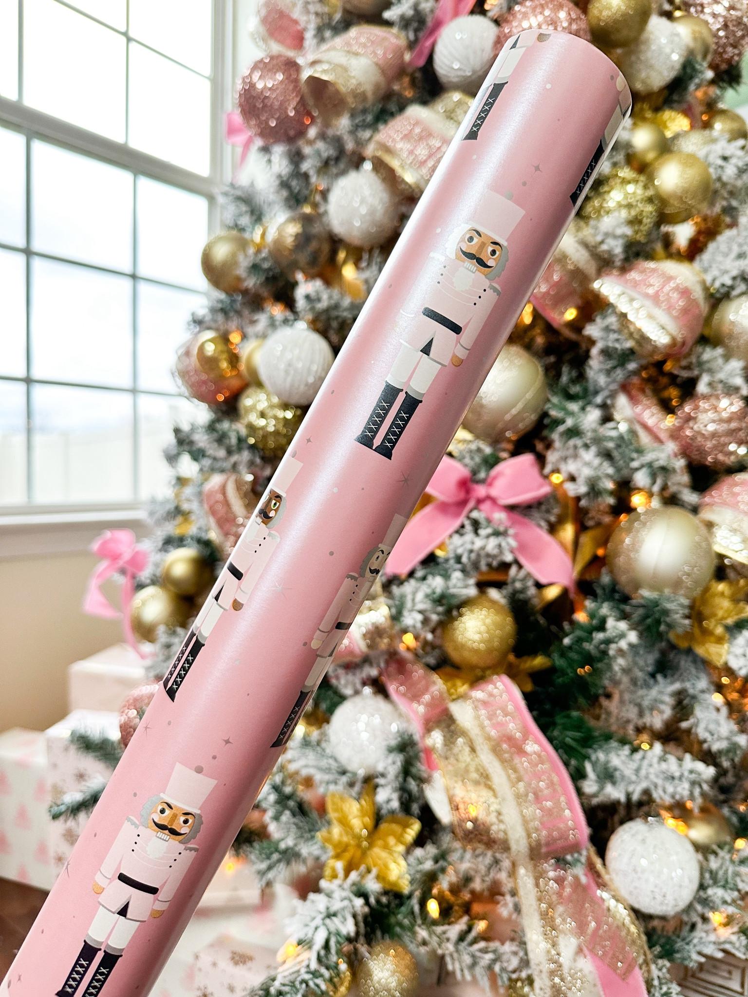 The cutest shimmery pink nutcracker wrapping paper 

#LTKSeasonal #LTKGiftGuide #LTKHoliday