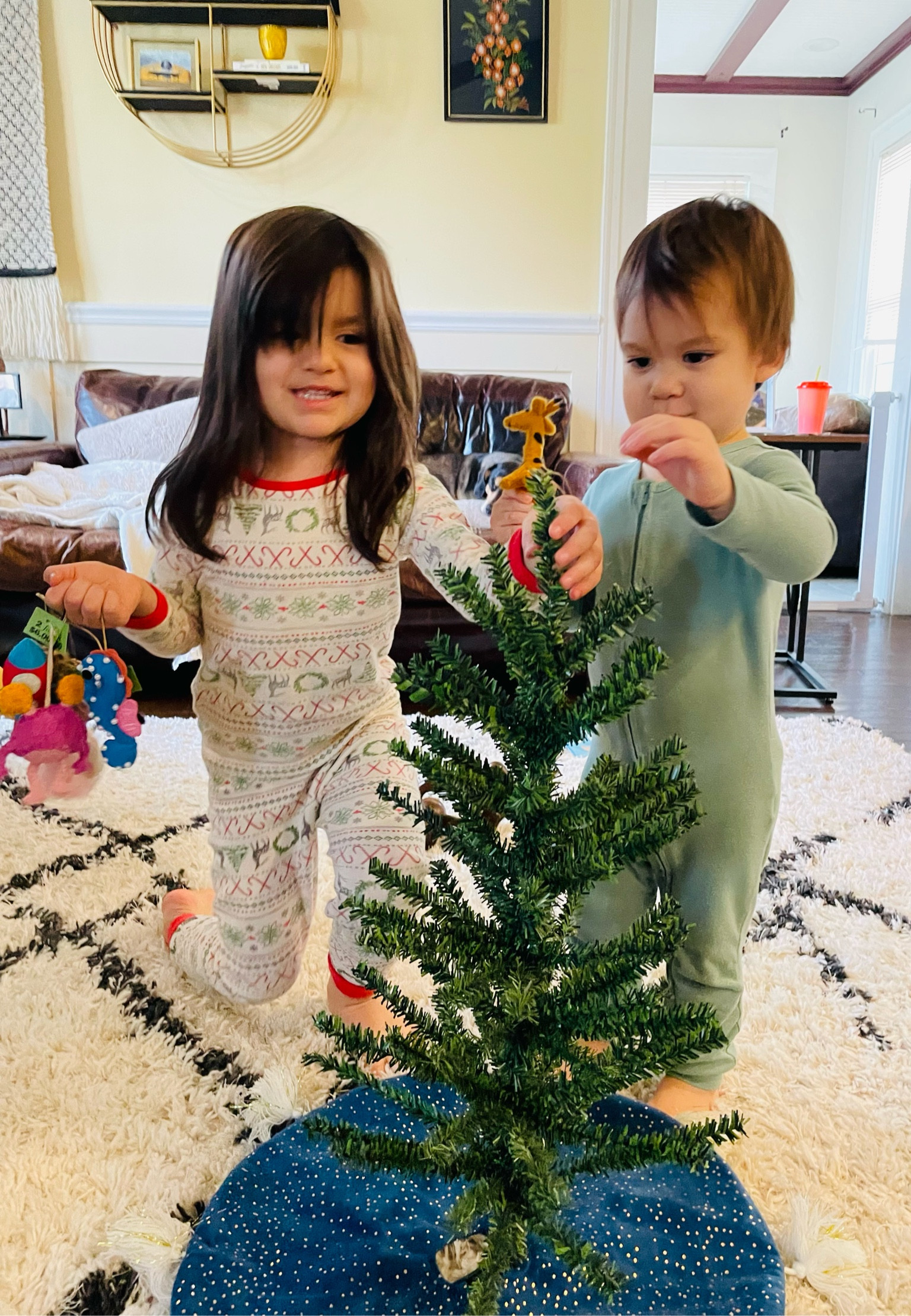 perhaps the best $10 you will spend this season 🎄 we got a felt tree last year with velcro ornaments that was cheaply made/got the job done & i will still probably buy another one  but these 2 had so much more fun decorating with real (unbreakable) ornaments .. & dare i say, a great opportunity for those little hands to practice fine motor skills 🙌🏽

#LTKkids #LTKHoliday #LTKSeasonal