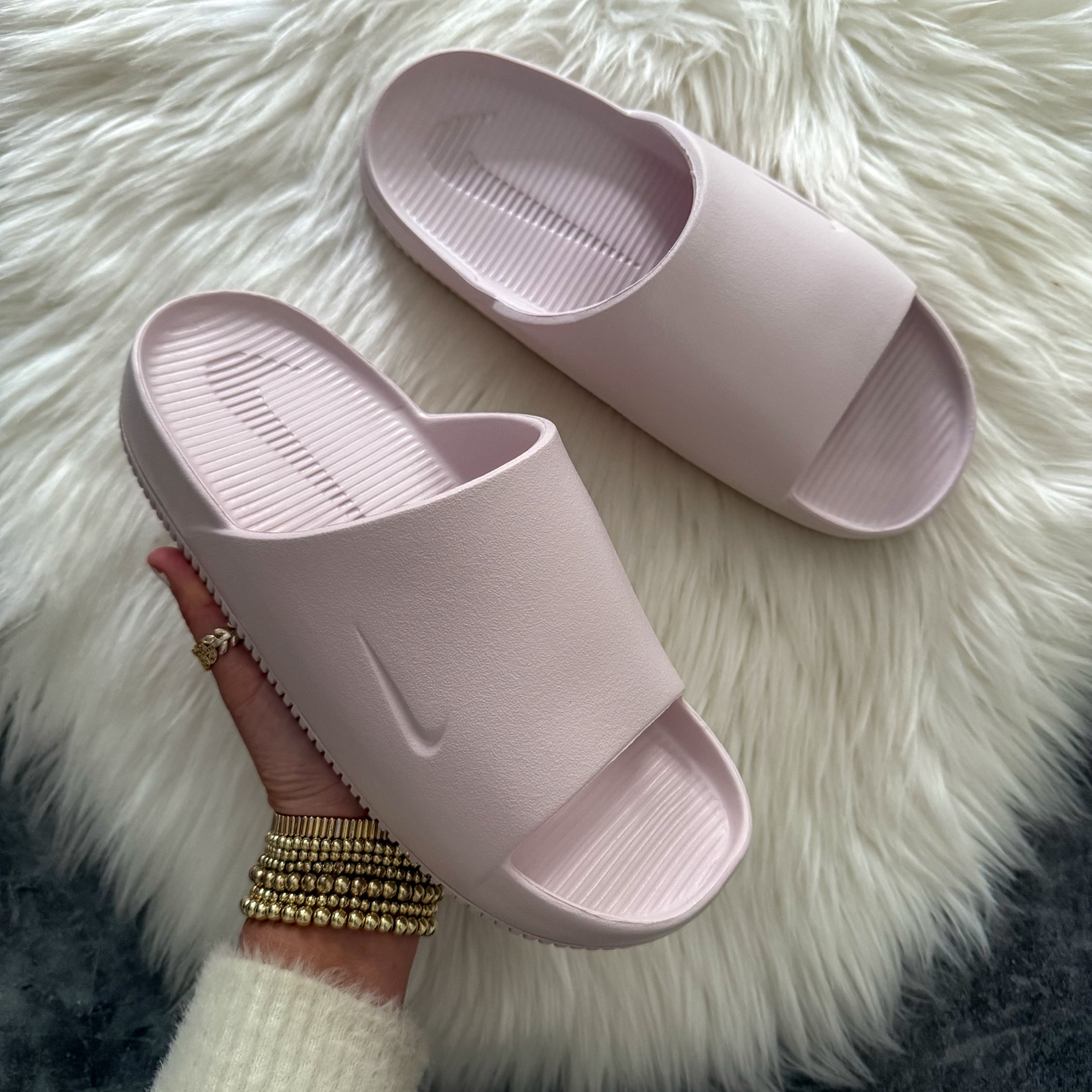 Nike calm women’s slides sandals. I went up a half size 