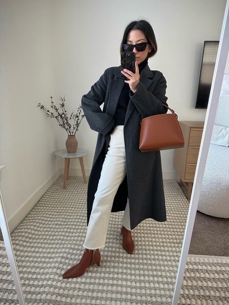 Fall outfit ideas. Coat and boot outfits. Coat is an old color but linked exact coat. 

Coats, boots, Thanksgiving outfit 

Mango coat xxs 
Everlane cashmere turtleneck xs (linked new version)
DL1961 jeans 25.  Cut hems. 
Staud boots 35. 
Staud bag (old) 
YSL sunglasses. 

#LTKSeasonal #LTKshoecrush #LTKHoliday