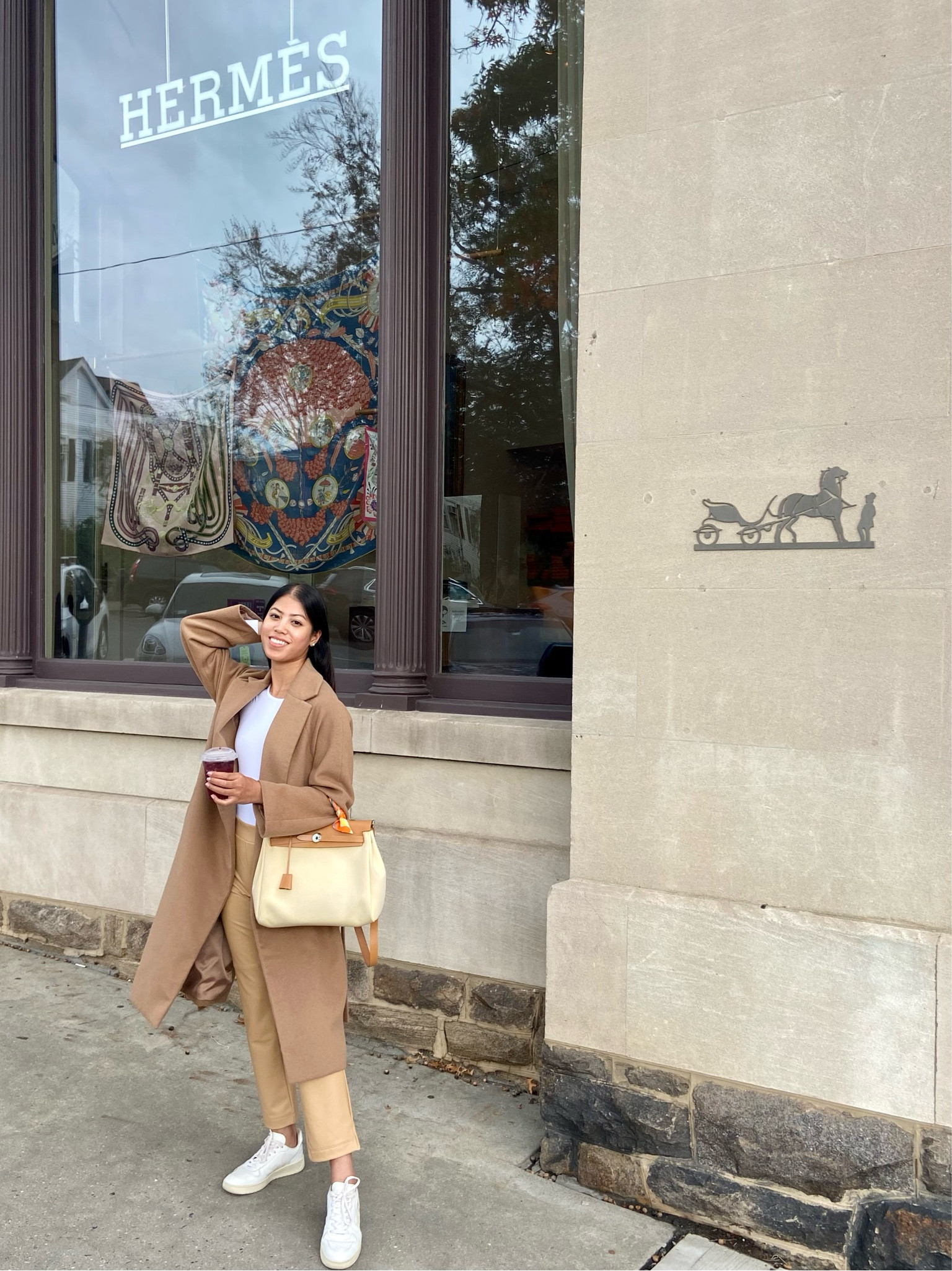 Fall style tip: a cozy and chic fall outfit starts with versatile basics that layer well together! Primary outfit colors: white and beige, my twilly scarf adds a pop of orange in the same hue. Textures: wool, leather, and canvas (bag). Perfect for a cooler day shopping in Greenwich!

#falloutfit #fallstyle #fallfashion #woolcoat #camelcoat #leatherpants #whitesneakers #beigestyle #beigeoutfit #neutralstyle #classic #timeless #greenwichct 

#LTKstyletip #LTKSeasonal
