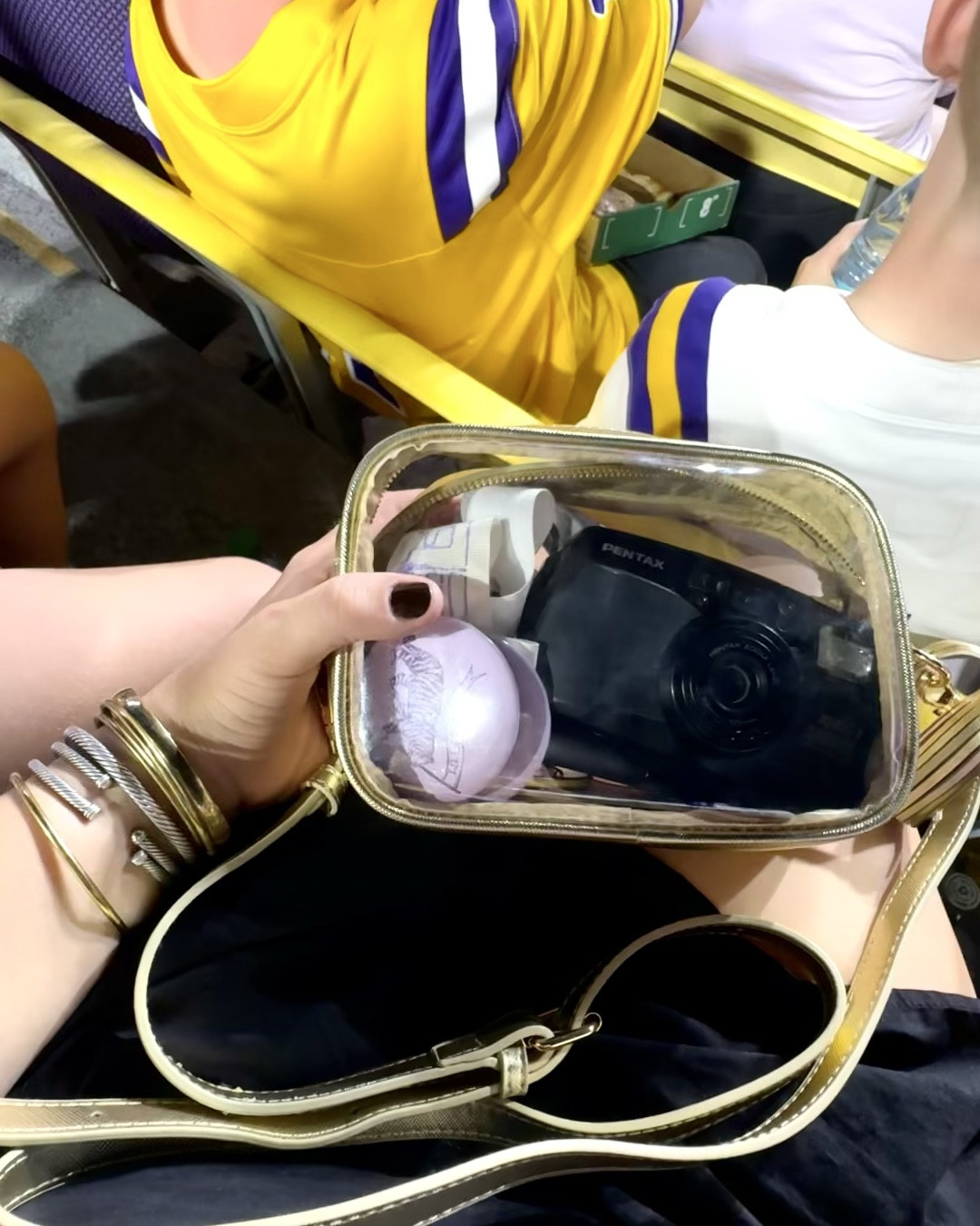 I’ve been looking for the perfect clear bag for a while and I struck gold with this one (pun intended) -perfect size and very good quality! Detachable strap and tassle, too! Highly recommend! 
Honorable mentions: dazzle dry polish (incredible stuff) and my gold bangles I wear everyday!

#LTKFindsUnder50