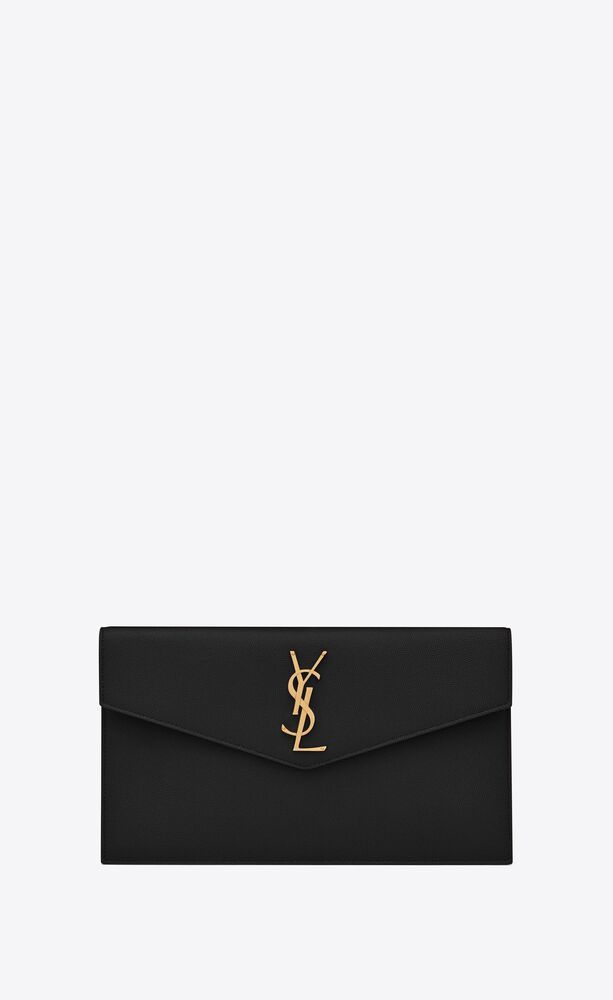 Small envelope clutch with a flap featuring metal YSL initials. | Saint Laurent Inc. (Global)