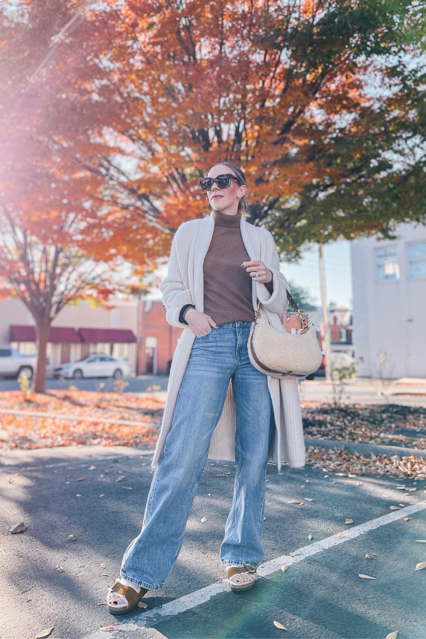 Fall outfit, wide leg jeans (under $35), shearling Birkenstocks, shearling bag

#LTKunder50 #LTKshoecrush #LTKstyletip