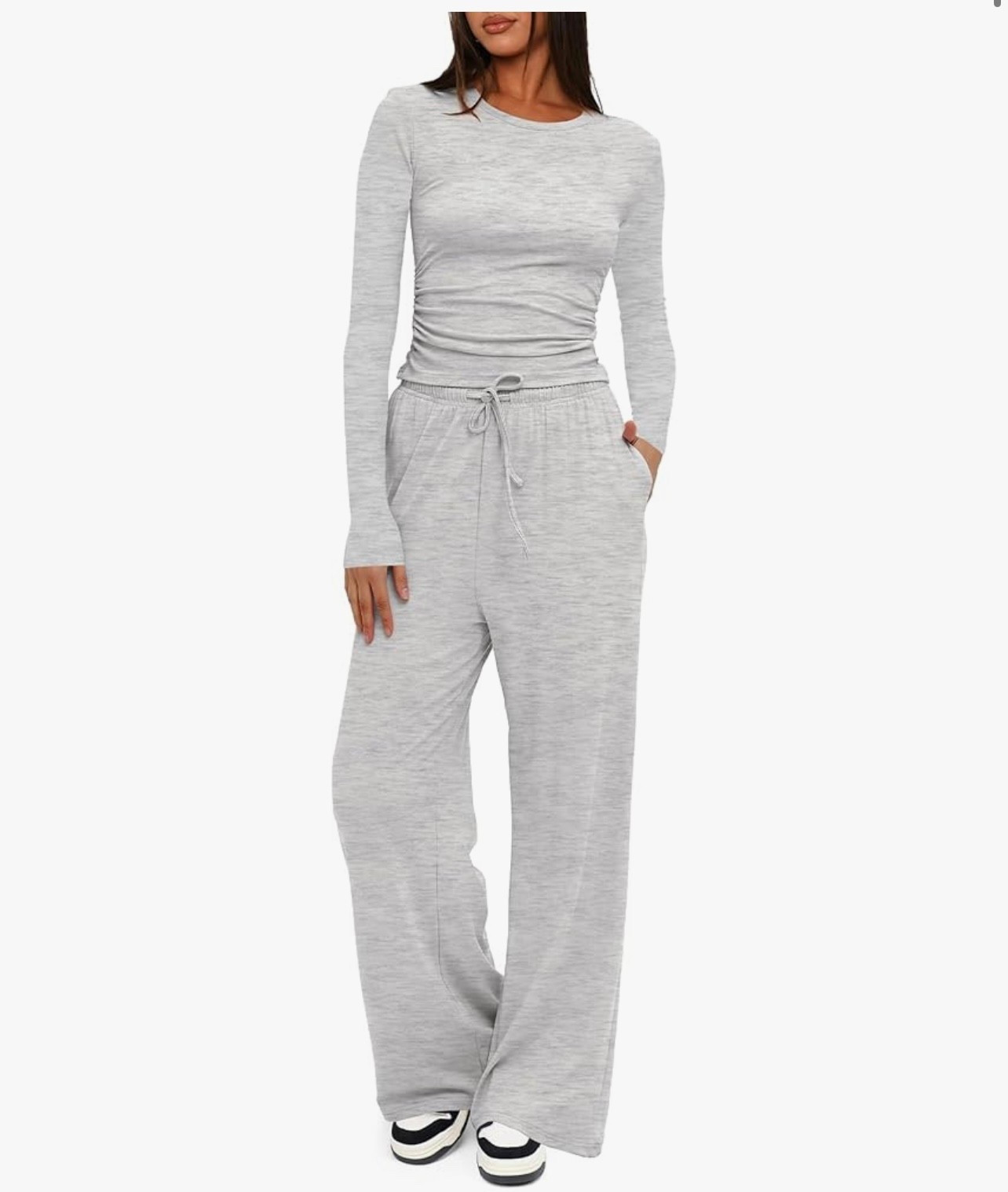 Effortless comfort meets style 🤍 This gray two-piece lounge set with a fitted long-sleeve top and wide-leg drawstring pants is perfect for casual days, travel, or lounging in style. Pair with sneakers for the ultimate off-duty look

#LTKFindsUnder100 #LTKMidsize #LTKSeasonal