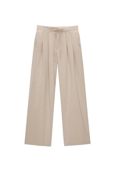 Pantalon fluide à pinces rayures tennis | PULL and BEAR FR