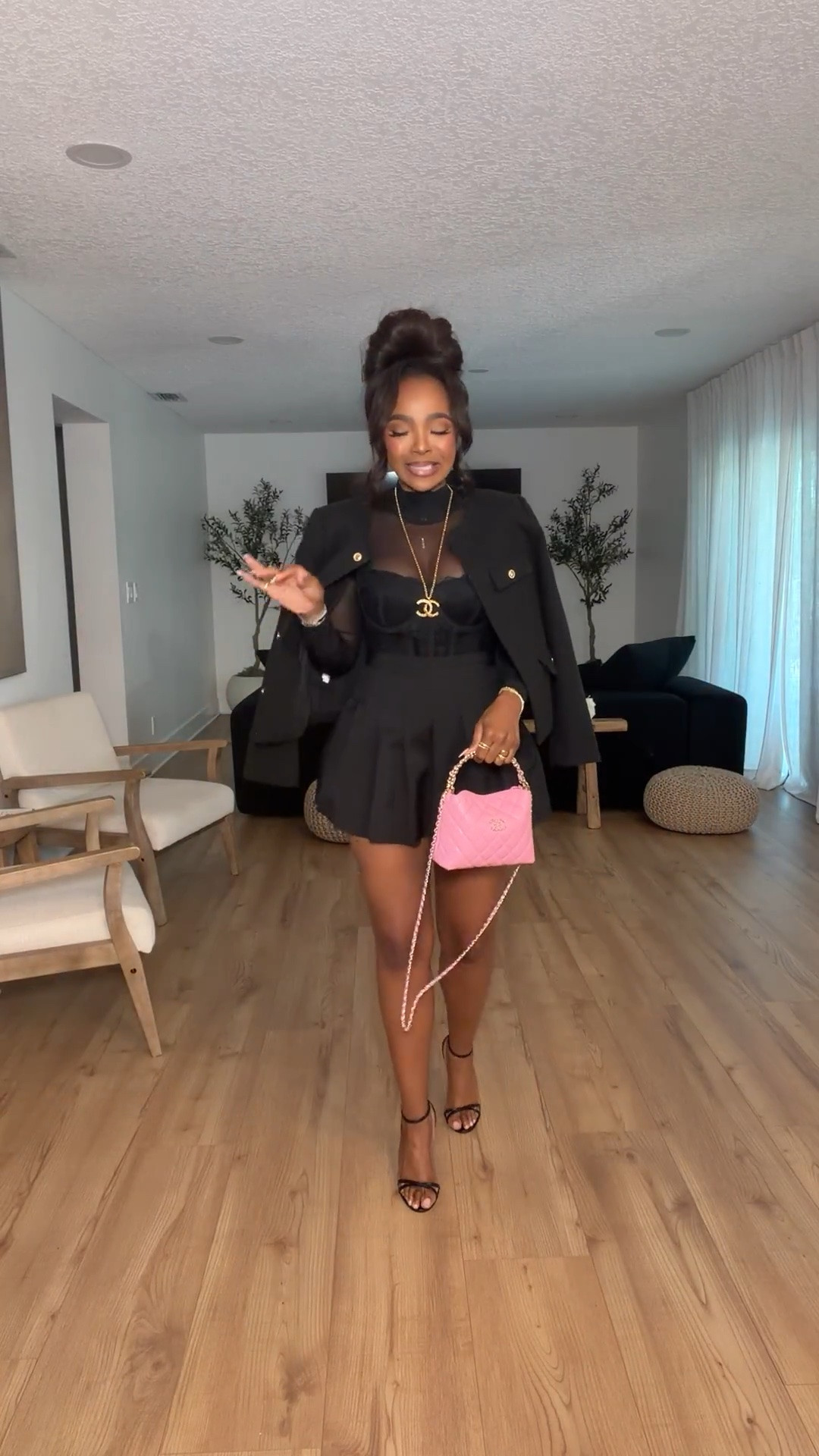 Hi babes!

This all-black look is that instant confidence outfit 🖤 The structured corset + pleated mini combo gives such a flattering shape, and layering the jacket on top makes it feel elevated and put together.

Added the pink mini bag for that pop of color — it completely transforms the look and makes it feel fun and feminine instead of just classic black.

Where to wear this:
• Date night or birthday dinner  
• Girls night out  
• Events or parties  

Undergarments: strapless bra or built-in support with seamless thong for a smooth finish.

Everything is linked below  

xx Kira | IG: KirasFashionFinds  

34D - 27 - 40 · Size Small / 4

#LTKootd #LTKgrwm #LTKvlog