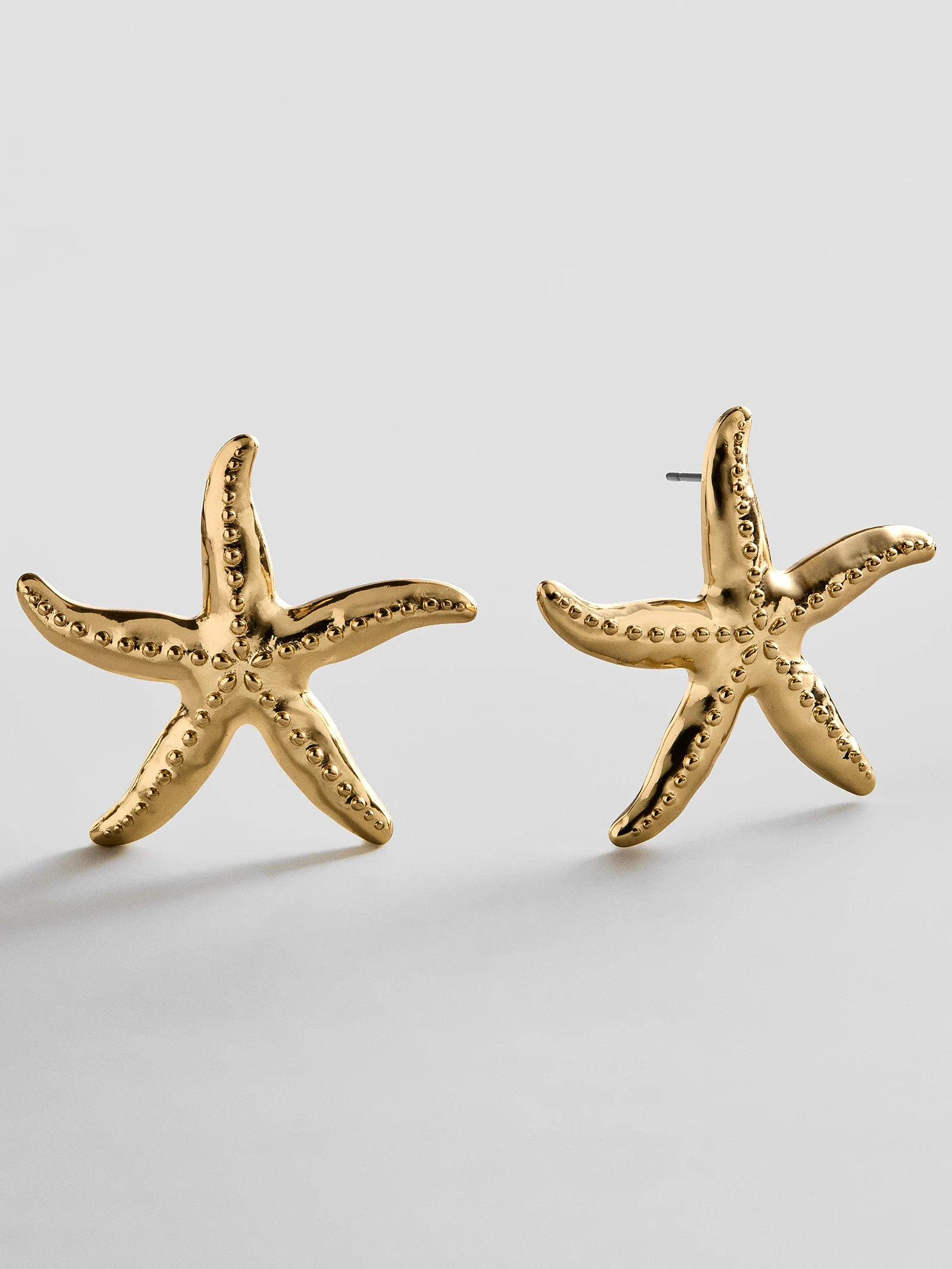 Swept Up Starfish Earrings - Gold | BaubleBar