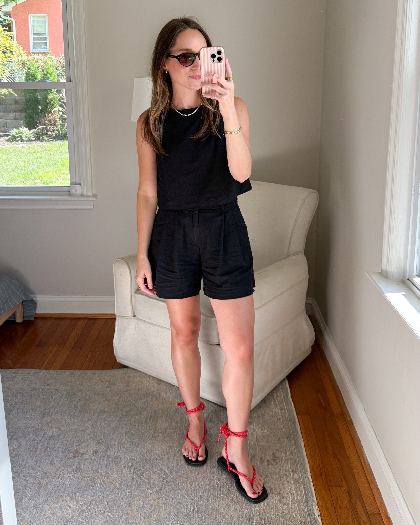 Top is on sale for $19. Wearing a small petite. Shorts are old and not available.