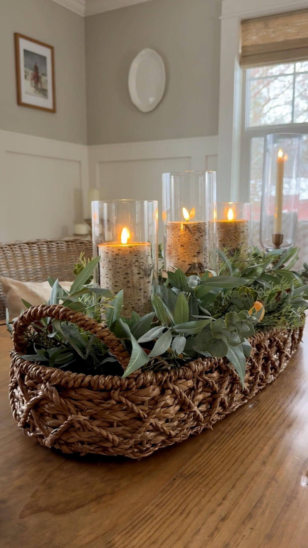 A soft winter glow for the dining table 🤍
This winter centerpiece starts with my long oval basket—a longtime best seller here and the perfect foundation for layering warmth. At the center is the citrus hurricane candle centerpiece from Grandin Road, filled with birchwood and remote-controlled flameless candles for an easy, cozy glow.
I paired it with glass hurricane stick candle holders from Pottery Barn, each finished with rechargeable flameless candles, to create height, balance, and that flickering light we love without the worry. The result is a winter dining room centerpiece that feels cottage-core, collected, and effortlessly inviting.
Candlelight really is the secret to making winter meals feel slower, warmer, and more intentional.

#LTKSeasonal #LTKHome