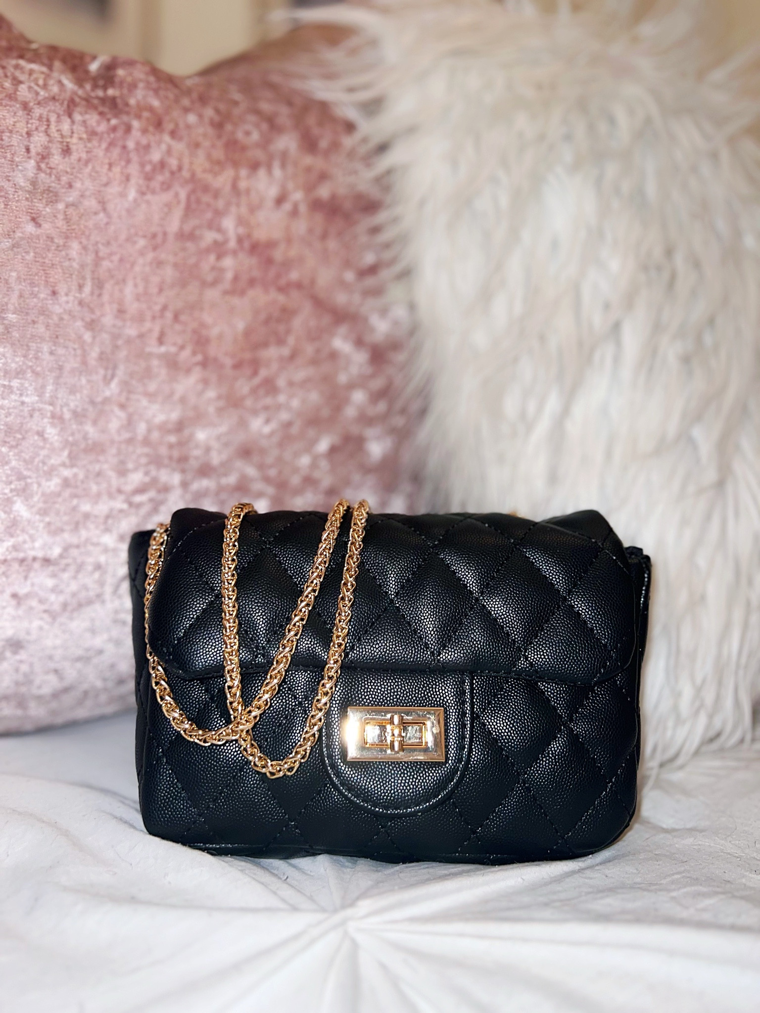 I got this cute bag from Forever 21 and it’s seriously the cutest! It was on sale for $10 and it holds so much stuff in it too! It comes in an off white shade as well.

#LTKsalealert #LTKstyletip #LTKfindsunder50