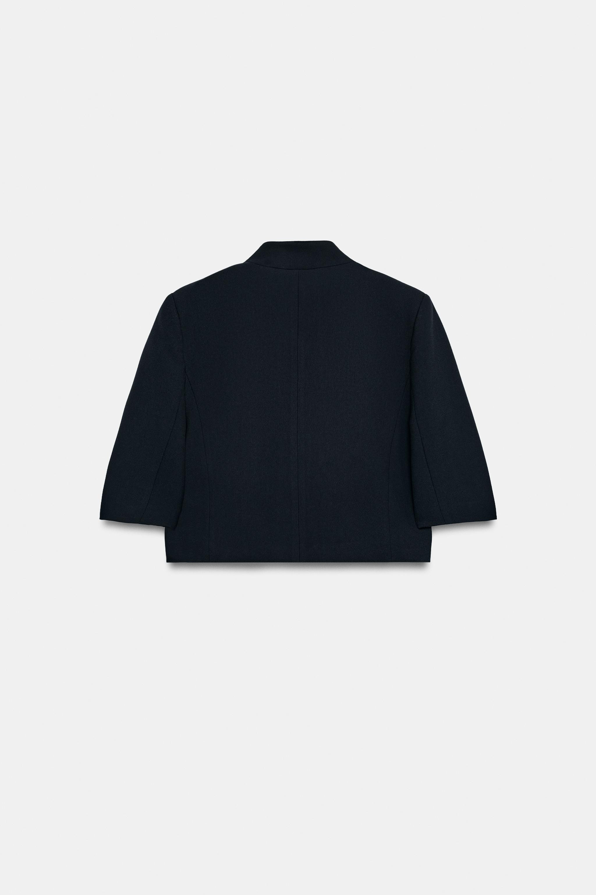 ZARA WOMAN COLLECTIONCropped blazer with a stand-up collar and short sleeves. Welt pocket on the ... | Zara US
