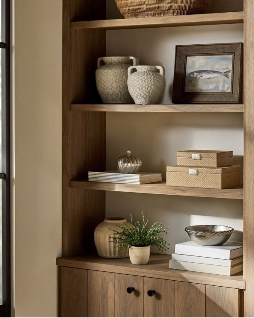 Whether you're accenting a bookshelf or creating a centerpiece, this Large Woven Texture Ceramic Vase from Threshold™ designed with Studio McGee beautifully blends farmhouse flair with timeless elegance. This decorative vase features a classic urn-shaped body with a distinct, raised basket-weave exterior and integrated side handles for an artisanal piece you can display on its own. Crafted from ceramic with a watertight construction, it's also perfect for displaying fresh or faux florals on your console, dining table or mantel.

#LTKHome #LTKSeasonal