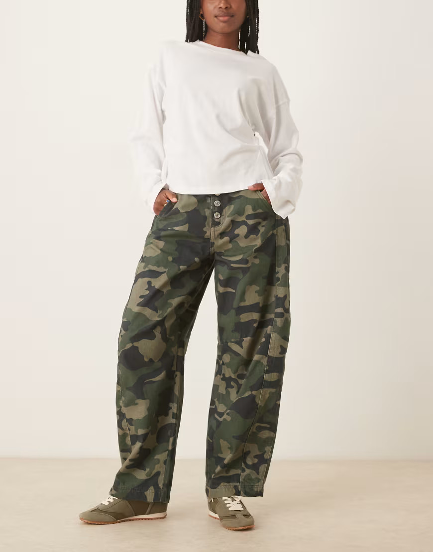 ASOS DESIGN cropped barrel leg jeans with button fly in camouflage print-Green | ASOS (Global)