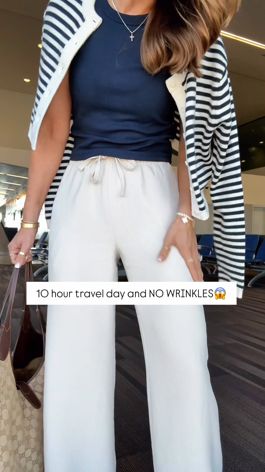 My travel outfit of the day! Aritzia The Lodge Pant - Crepette. Size XS regular, but I prefer short (I ended up comparing the 2). Comes in short and tall, too. Wrinkle resistant with an elastic waist and high-rise. Aritzia t-shirt in XS. Aritzia striped cropped cardigan in 2XS. Jelly ballet flats are whole sizes only. I’m a 6.5 and sized down to a 6 per reviews. Business casual. Elevated casual. Workwear. Coastal outfit.
