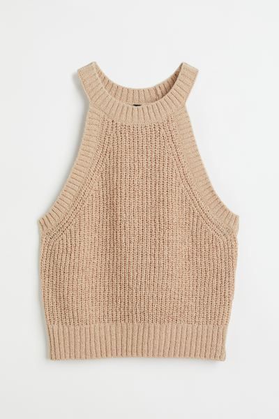 Sleeveless knit crop top with ribbing at neckline, armholes, and hem. Narrow cut at top with a ro... | H&M (US + CA)