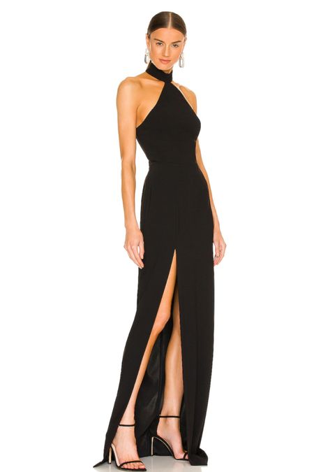 This black formal dress is so sexy! You will love this black formal dress with a halter neck and a slit

#LTKwedding