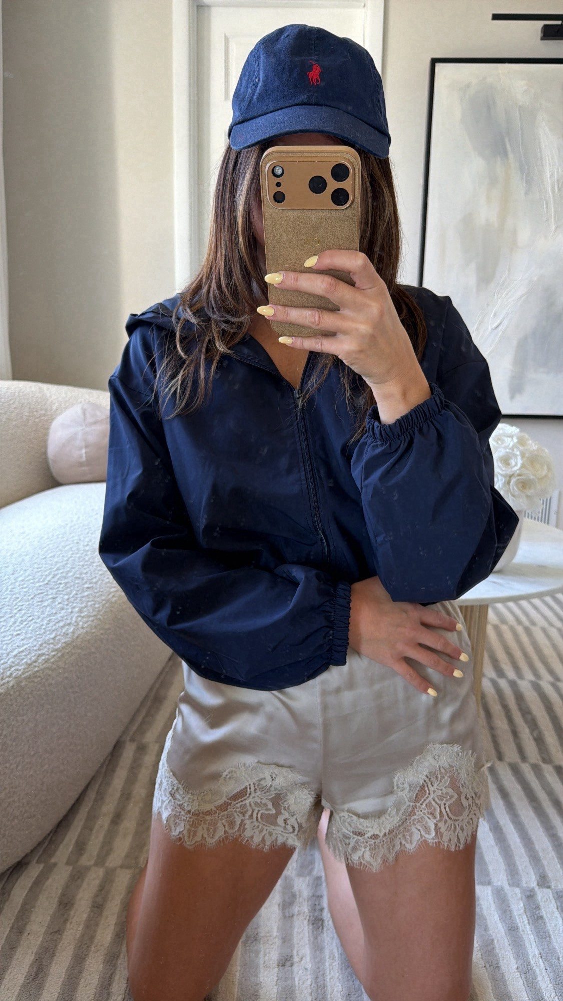 Get the look! Navy blue Ralph Lauren baseball cap, silk lace shorts, windbreaker jacket, summer outfit idea.

#LTKootd #LTKSaleAlert