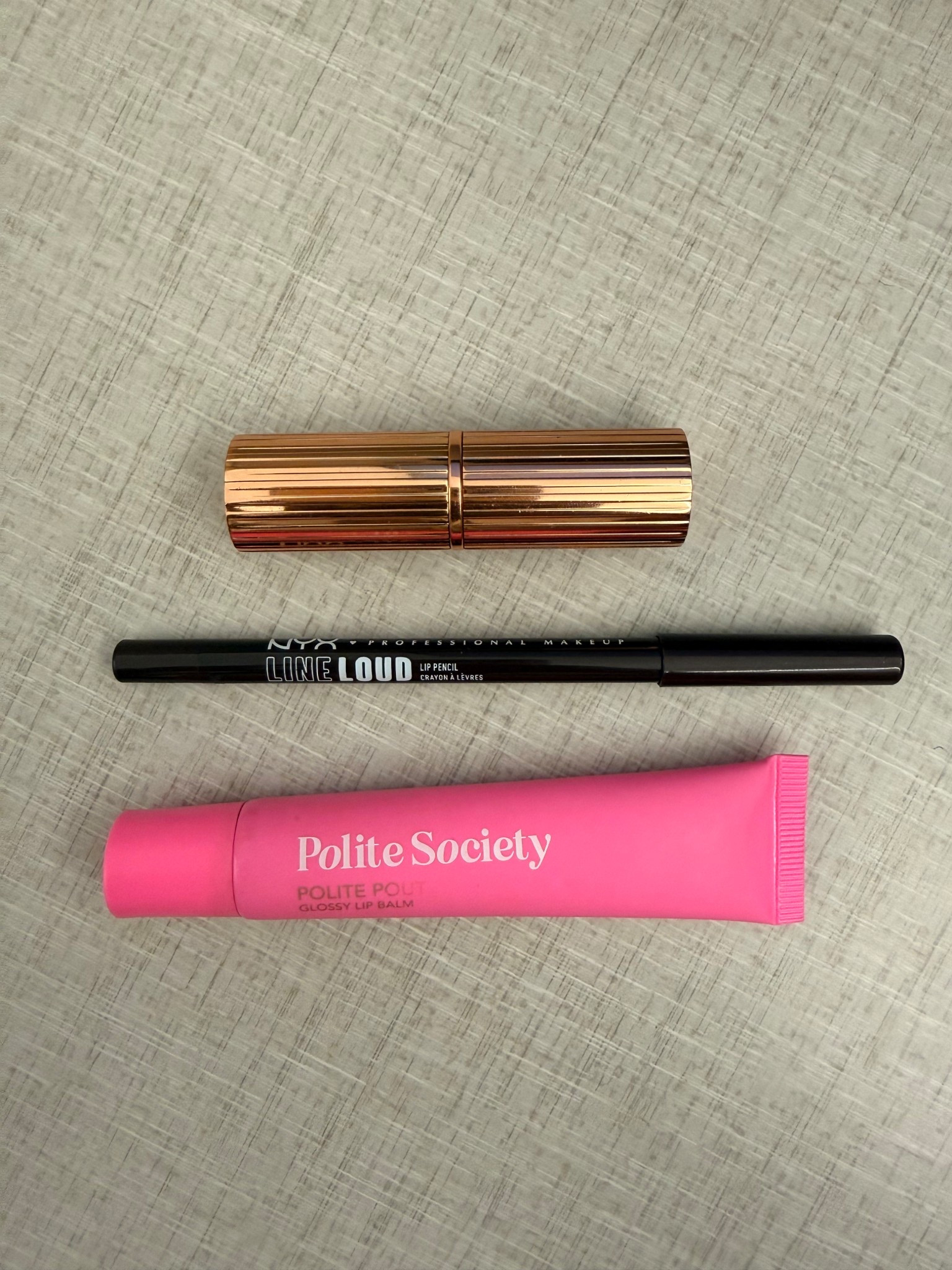 Today’s lip combo:

Liner: Nyx line loud lip pencil (kind rebel) 
Lipstick: charlotte tilbury (pillow talk medium)
Gloss: polite society glossy balm (jelly bean) 

FYI the liner is like a chocolate brown but it’s coming off black in the photo 

#LTKBeauty