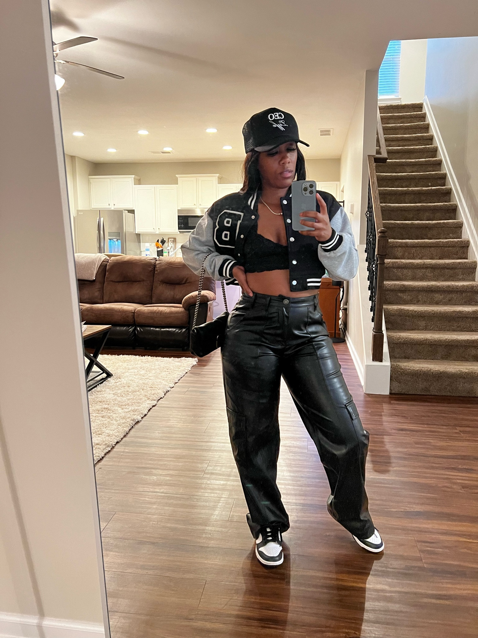 How to style a cropped varsity jacket with black faux leather cargo pantss

#LTKStyleTip #LTKFindsUnder50 #LTKSeasonal