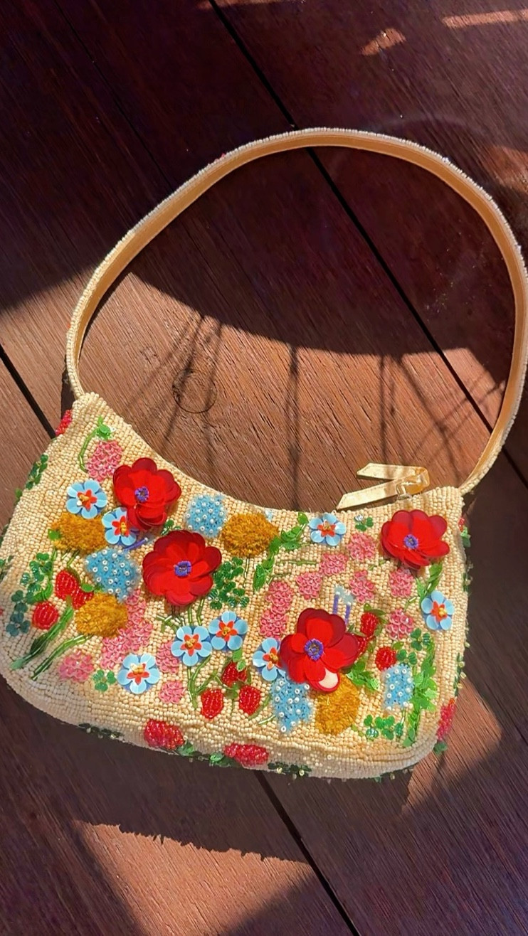 This bag is pure joy. 🌸
Hand-beaded flowers, bright colors, and just the right amount of vintage charm. The Vera Bradley beaded purse is the statement piece your outfit didn’t know it needed.

#LTKootd #LTKgrwm #LTKSpringSale