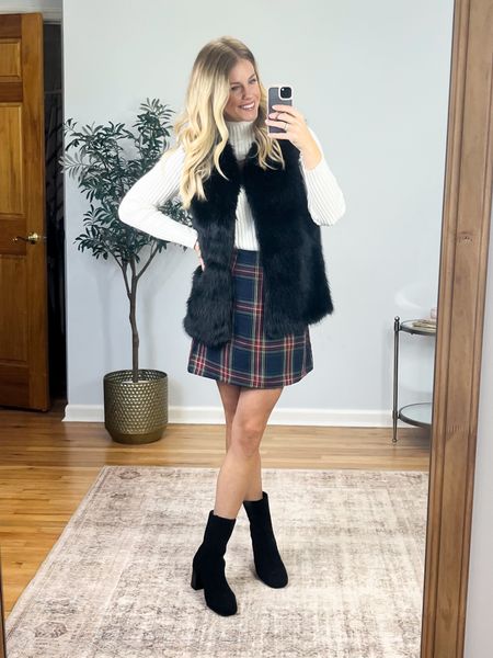 The prettiest plaid skirt and sweater paired with this fun faux fur vest! Obsessed. Size medium in the sweater, skirt, size small in the vest! Perfect for family photos! Code Jacqueline15 saves 15% on orders $65+. Shoes fit true to size.

#LTKfindsunder50 #LTKHoliday #LTKsalealert