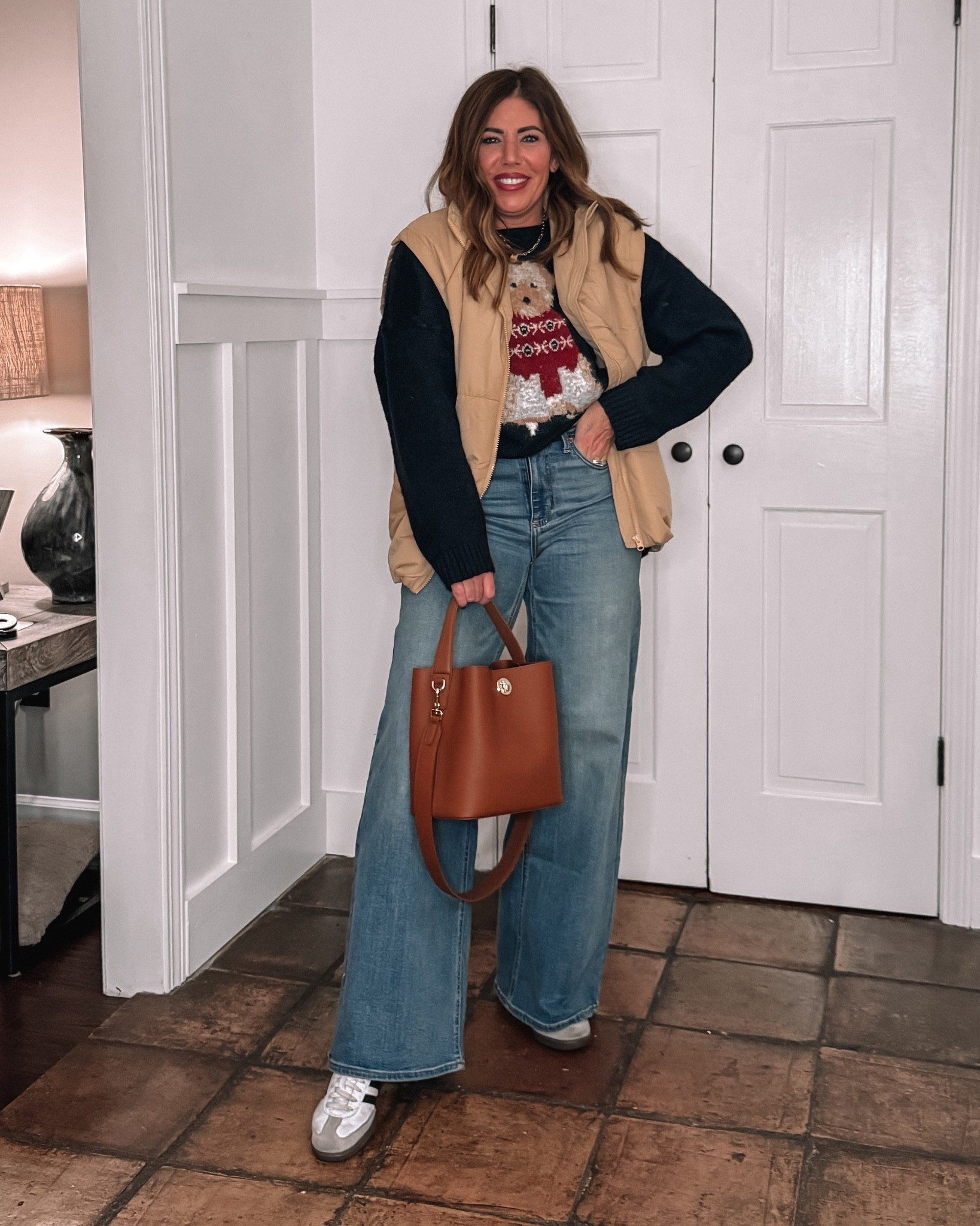 Super cute casual Holiday outfit, 
$25 target sweatshirt, size xxl (I sized up for an oversized fit)
$29 Look for less puffer vest size large
20% off Wide leg universal thread jeans
Real Leather bucket bag under $75 from Amazon


#LTKHoliday #LTKMidsize #LTKOver40