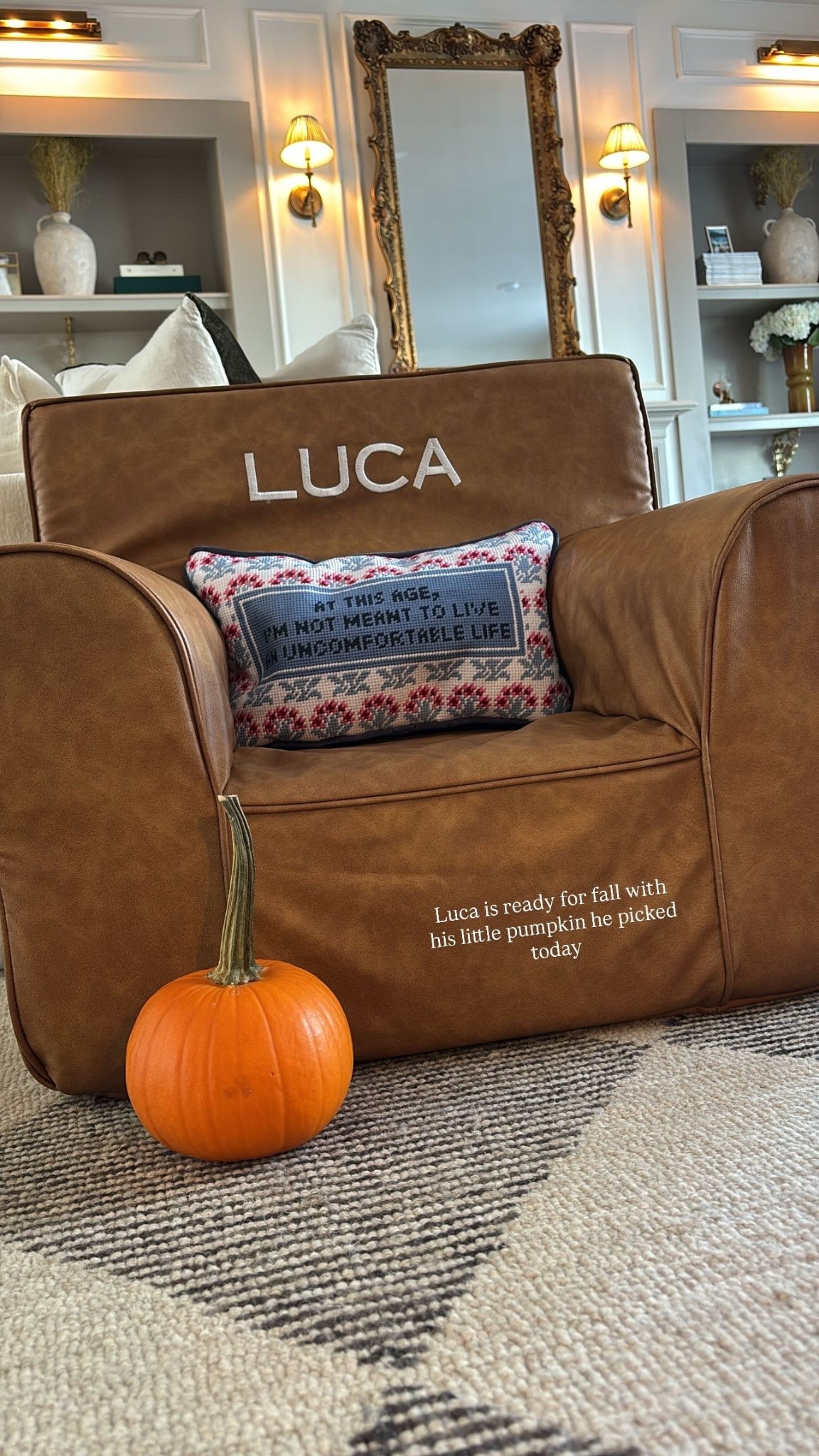 Luca is ready for fall with his little pumpkin he picked today