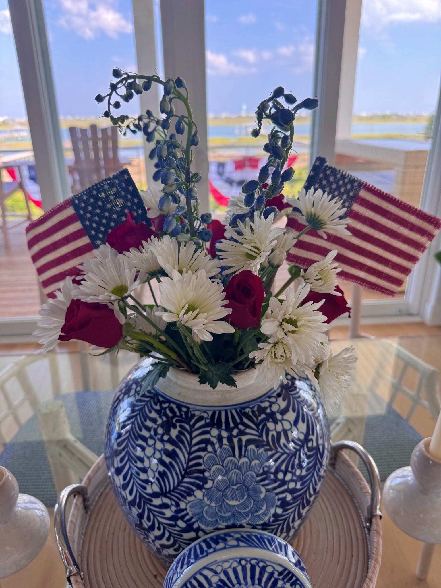 A gorgeous timeless Ginger Jar I use year round ready for Memorial Day and 4th of July 🇺🇸 Stunning vintage burlap flags are a perfect accent 

#LTKHome #LTKSeasonal