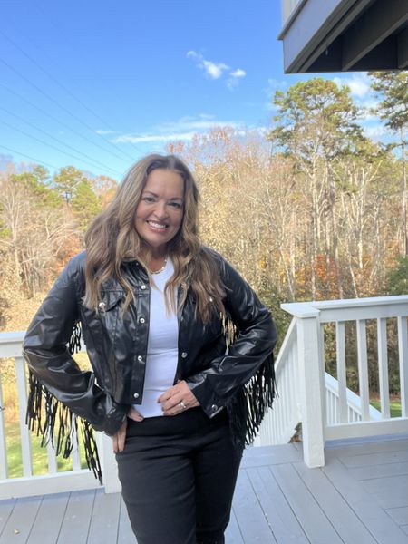 A fun concert jacket with fringe and embroidered white flames in the back

#LTKstyletip #LTKGiftGuide #LTKtravel