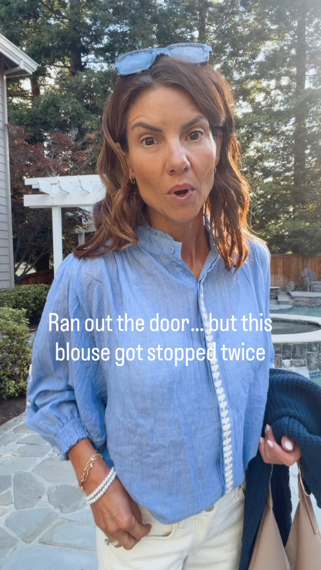 Effortless outfit of the day • lightweight chambray blouse • flattering straight leg jeans • easy everyday style

Ran out the door and ended up getting stopped twice about this blouse 🤍
It’s lightweight with the prettiest details (sleeves + front) and just elevates a simple jeans look.

Wearing it with my go-to straight leg jeans, ballet flats, a navy sweater, and gold jewelry for an easy, pulled-together feel.

I am 5'7" tall. I am wearing a size 25 in the jeans. They are lightweight no stretch and fit true to size. I'm wearing a size small in the top and sweater.  Top and sweater are available in other colors.  

#LTKWorkwear #LTKOver40 #LTKootd