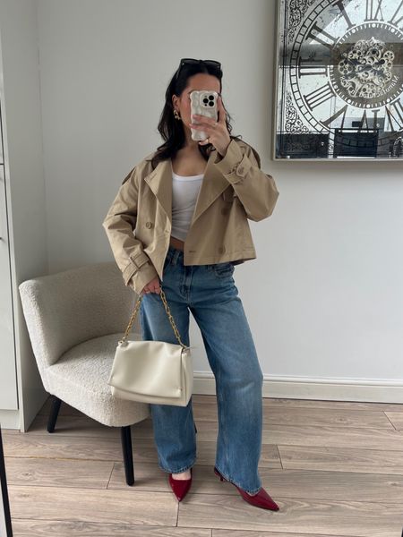 Trench coat outfit, cropped trench coat, low waist jeans, scoop neck tank top, burgundy heels, spring outfit, pull&bear, asos  

#LTKfindsunder100 #LTKstyletip #LTKSeasonal