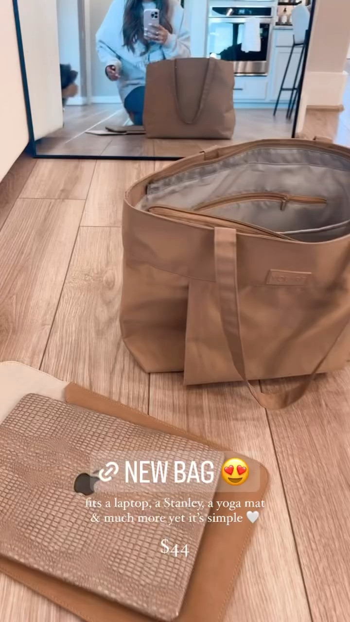 The perfect sleek simple tote bag from volare with a holder for your Stanley inside, yoga mat on the outside, a great work bag because it fits a laptop perfectly with compartments for everything else 

#LTKtravel #LTKitbag #LTKworkwear