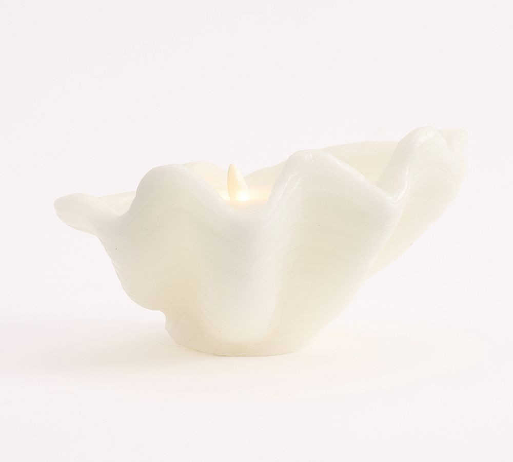 Nautilus Shell Candle    Clearance $14.97$99.50  85% Off              SKU: 7665778 | Pottery Barn (US)