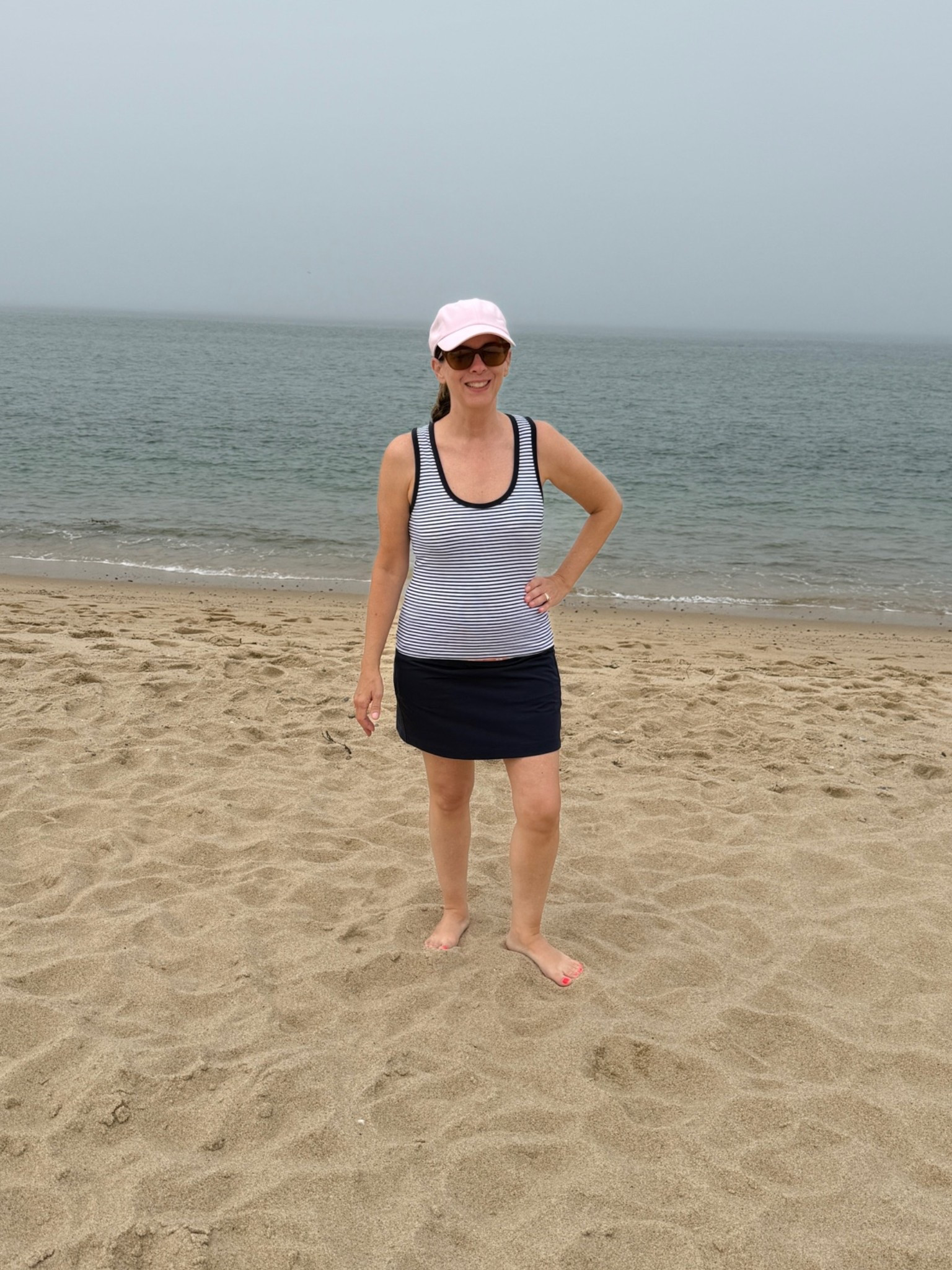 Beach travel days! I’m wearing a navy and whites striped tank top with a navy skirt. 💙🌊

#LTKTravel #LTKOver40 #LTKPetite