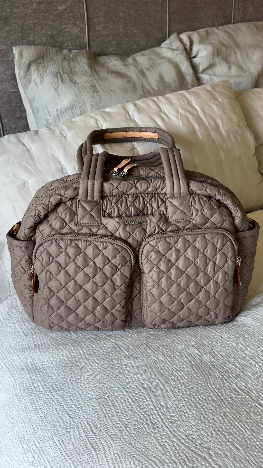 Chic & functional travel bag. If you are in the market for a new one, I highly recommend this nee style that looks good and works out perfectly for travel. 
- Lightweight, well thought out organizational details, can fit under airplane seat. 
- Shoulder or crossbody carry; plus sleeve to put on top of rolling luggage. 
- Quality of bag is excellent. 
- Available in multiple colors; exact color here is morning dove. 
- Travel outfit: athleisure style. 
- Travel shoes: comfy sneakers. 
- Mini bag is a convertible bag that I’ve used for recent vacations. 


#LTKItBag #LTKTravel #LTKOver40