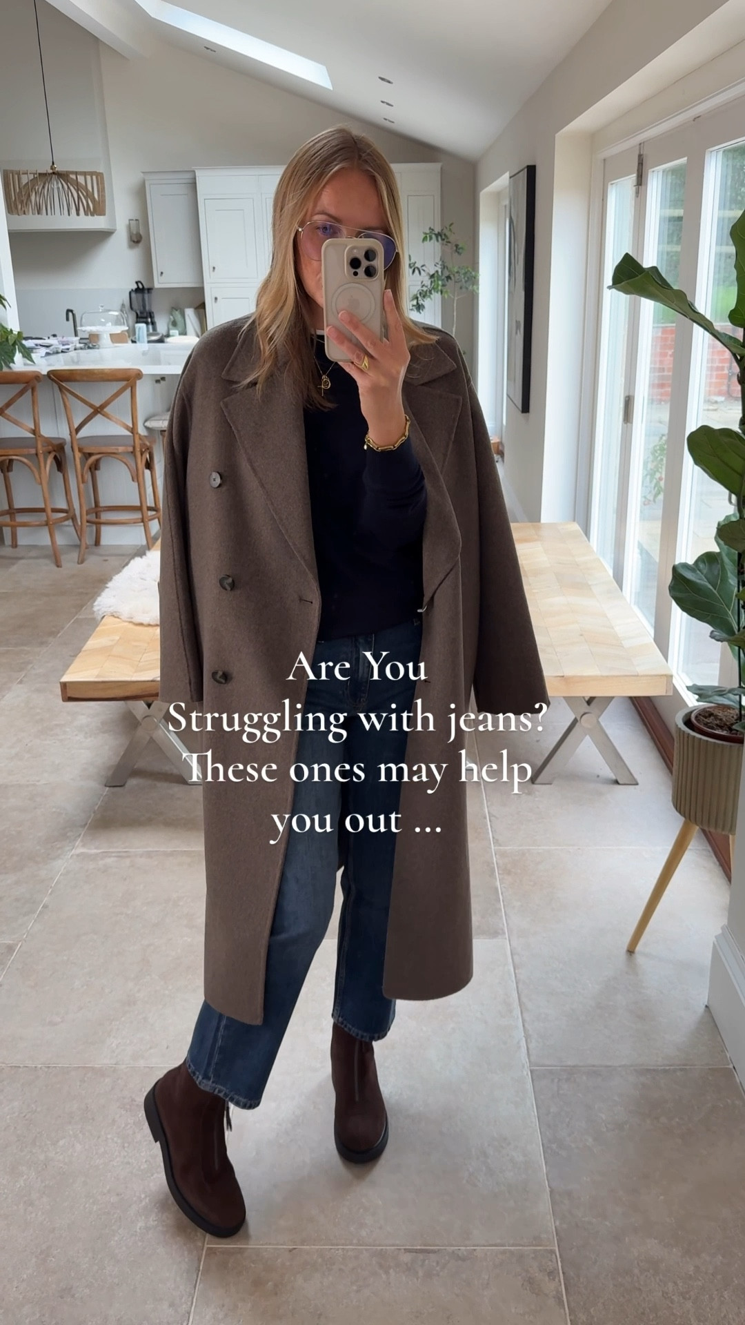 I’ve been buying these jeans for years for clients. 
They are an authentic 100% cotton denim , a slim straight leg and sit at the ankle. 
I’m wearing a U.K. 14 - fit me snug 
If inbetween sizes you may want to size up. PRO tip - often high street jeans will measure slightly different on the same size garment - try two pairs if instore so you can get the perfect one for you. 

If you need a touch of stretch the hush jeans below are a very similar silhouette - just a touch of stretch . 


Paired with a few of my current hardworking favourites … 

Extra fine merino wool crew neck sweater - great for layering! 
Size large 

White crew neck T shirt - 100% cotton 
Size medium 

Drapey Wool blend overcoat , styles up and down with ease - a firm client favourite. Wearing a large 

Boots are comfortable and offer great value - almost identical to another £300 pair I know ( I’ll link below) 
The shape , zip and heel height are 👌🏻 - true to size . 

#LTKshoes #LTKjeans #LTKautumn