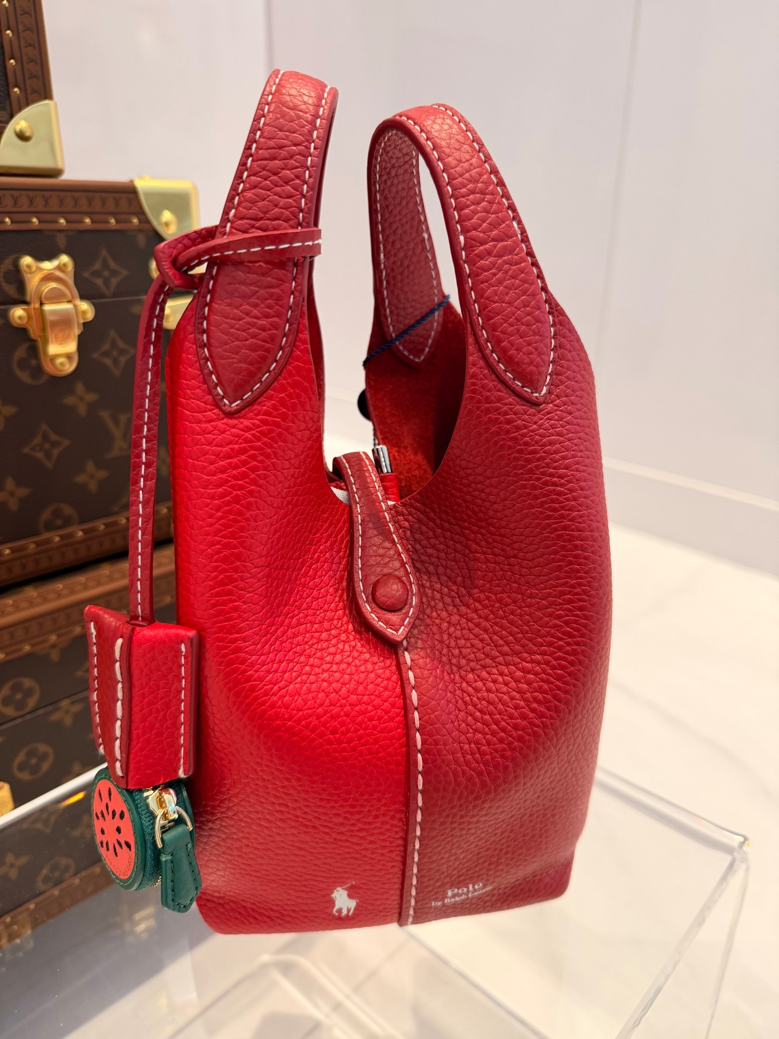 How cute are these bucket bags from Polo by Ralph Lauren. Adding a pop of color with these playful mini bags never look so chic. Available in Many Colors and also they come with removable strap for a crossbody option.