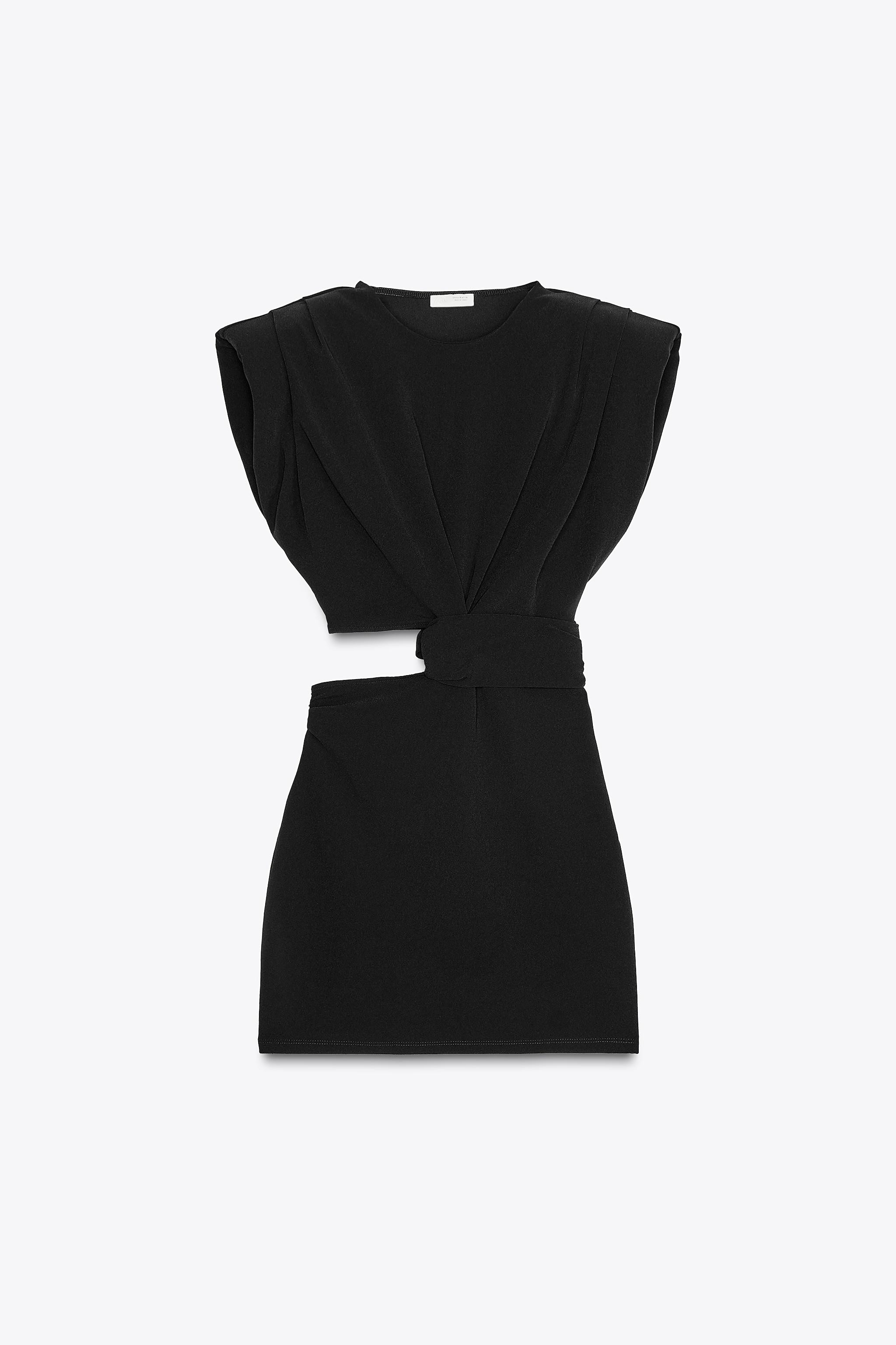 Short dress with round neckline and sleeveless armholes with shoulder pads. Cutout detail and dra... | Zara US