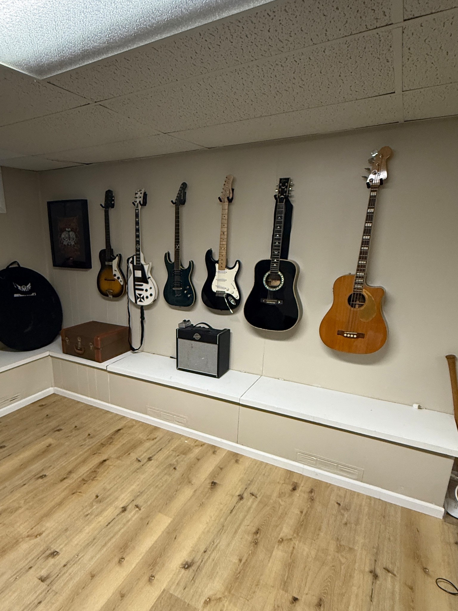 Guitar storage idea for musicians - great way to save space and make an art installation 

#LTKFindsUnder50 #LTKHome