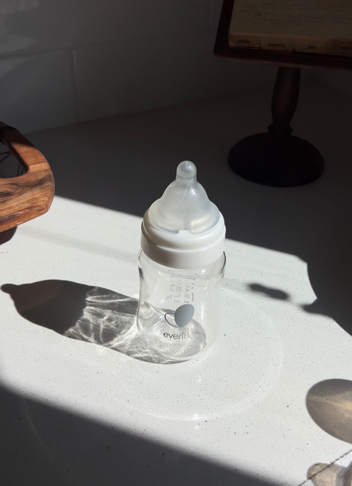 Anti-colic, nipple mimicking glass bottles