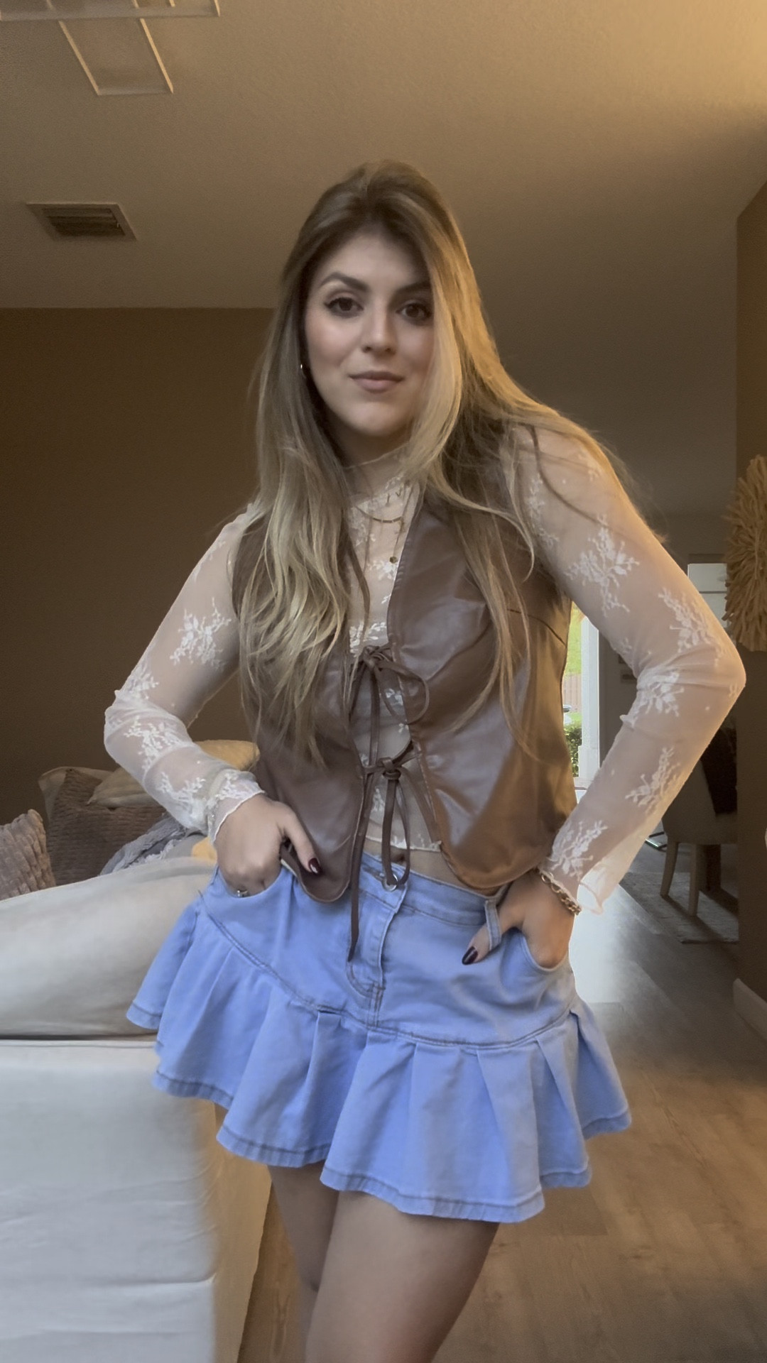 Obsessed with this mix of textures for Miami fall! 🍂 The leather vest, lace top, and ruffled denim skirt are giving major boho-chic vibes. Perfect for embracing fall trends with a casual yet stylish twist. Would you rock this look? 

#LTKStyleTip #LTKFindsUnder50 #LTKMidsize