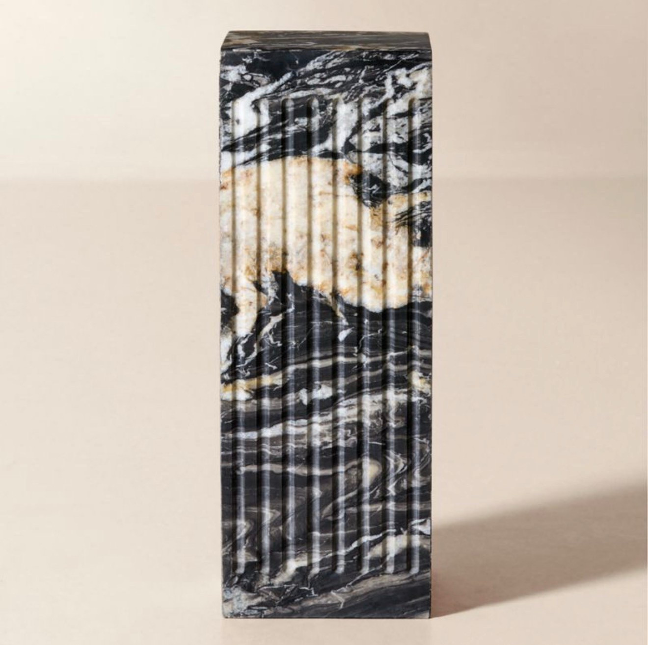 Albi Black Marble Side Table

Modern side table by NYC-based designer David Aguirre is defined by fluted black forest marble with rich white and cream veining that makes each piece unique

#LTKStyleTip #LTKParties #LTKHome
